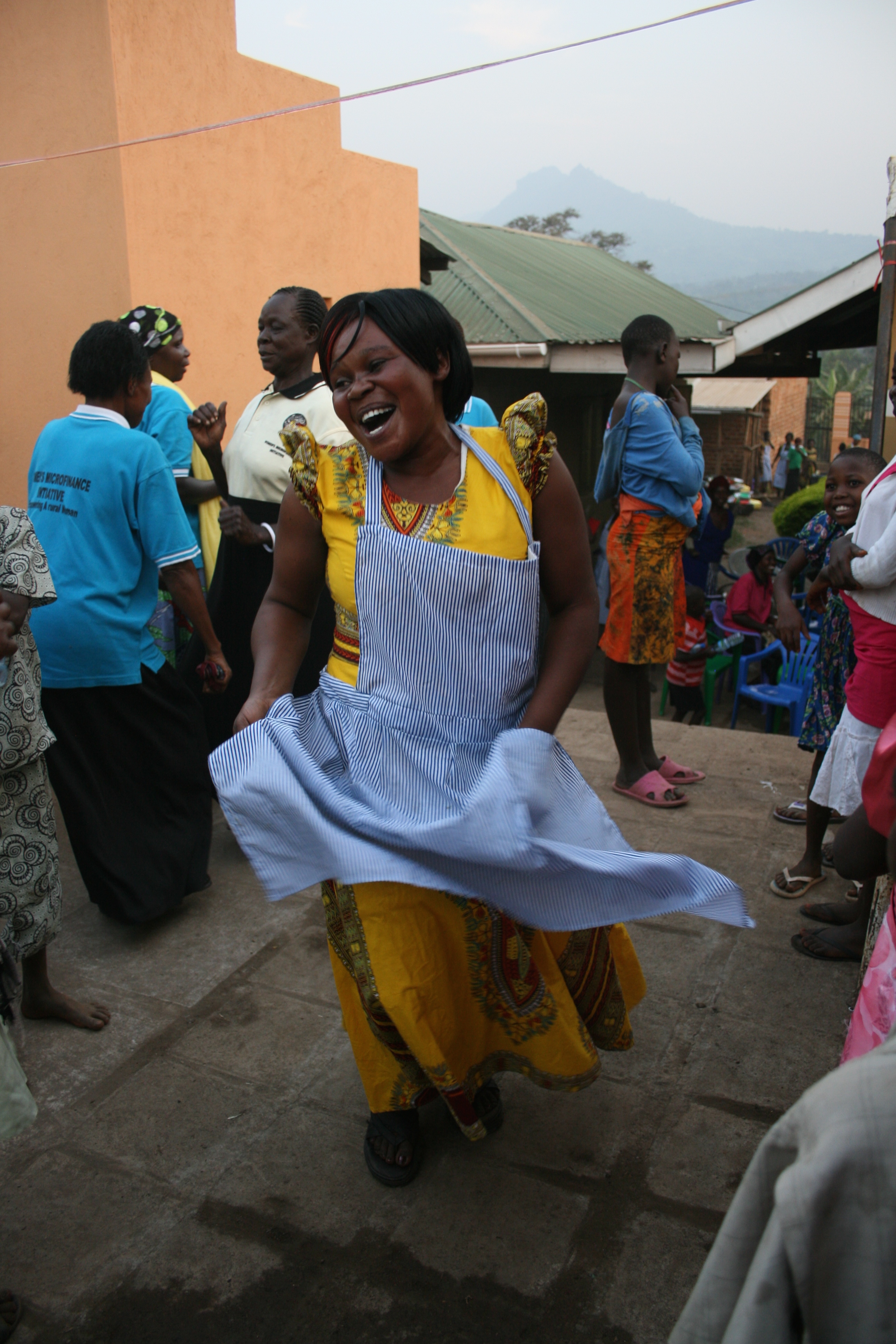 Woman dancing at WMI Uganda graduation